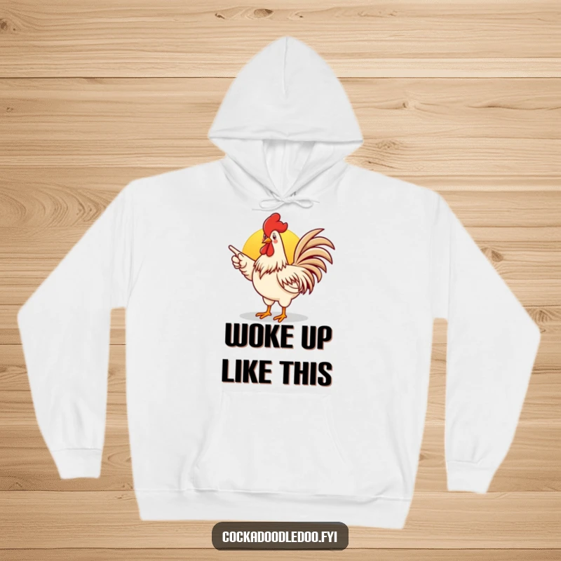 Funny rooster hoodie featuring an enthusiastic rooster pointing towards a sunrise, perfect for cozy mornings.