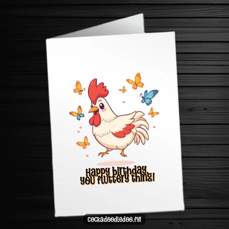 Funny Free Printable birthday card: a playful Kawaii rooster with a big grin chasing colorful butterflies.